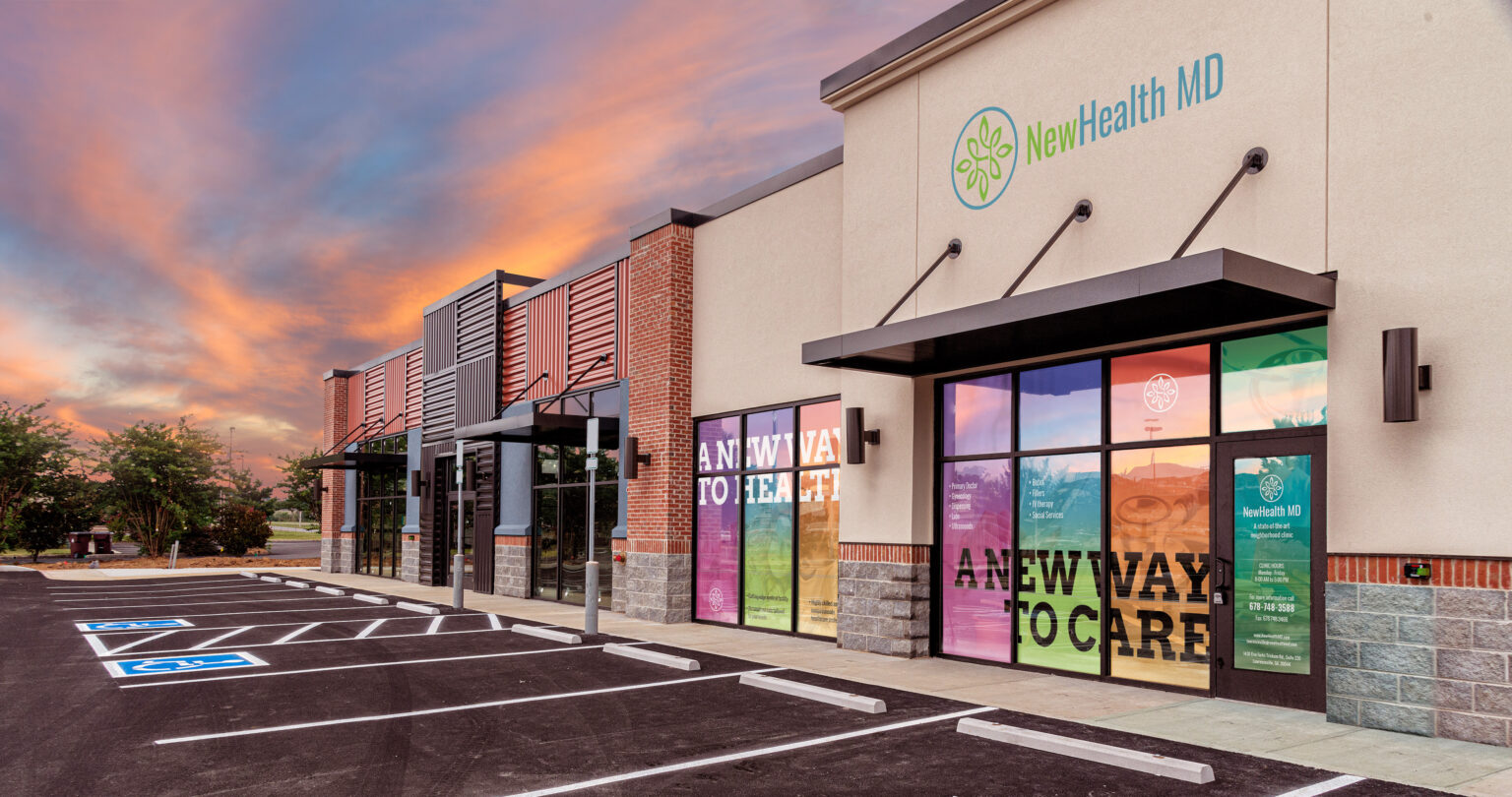 NewHealth MD clinic exterior at sunset